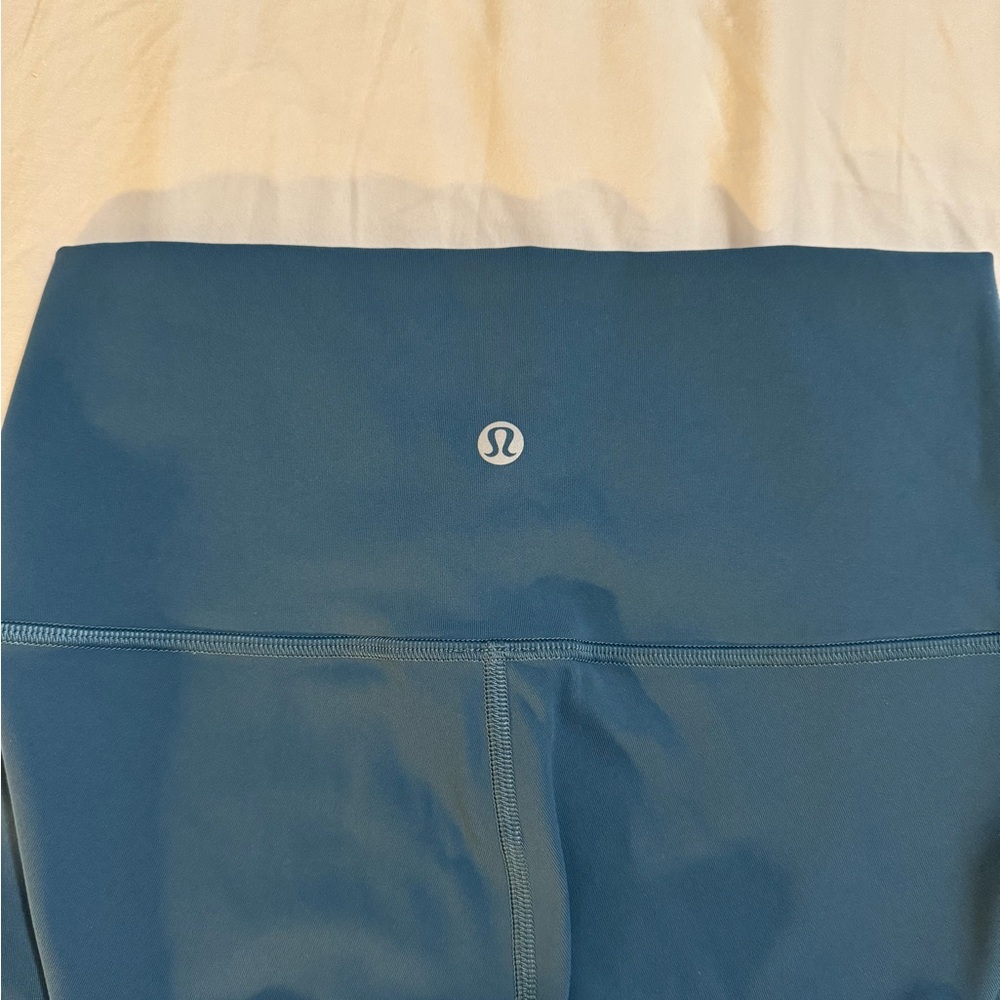 Lululemon mid-rise turquoise leggings -great condition- size 4L
